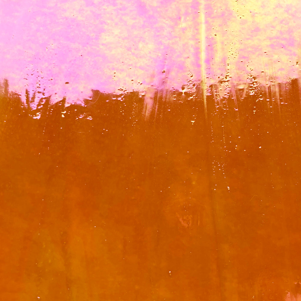 Piastra di vetro arancione iridescente