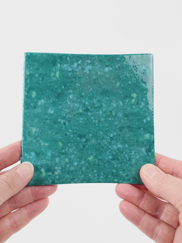 Video showing Morasutti Smalti mosaic tile – green_blue – 11.5 x 11.5 cm, rotated to show full tile